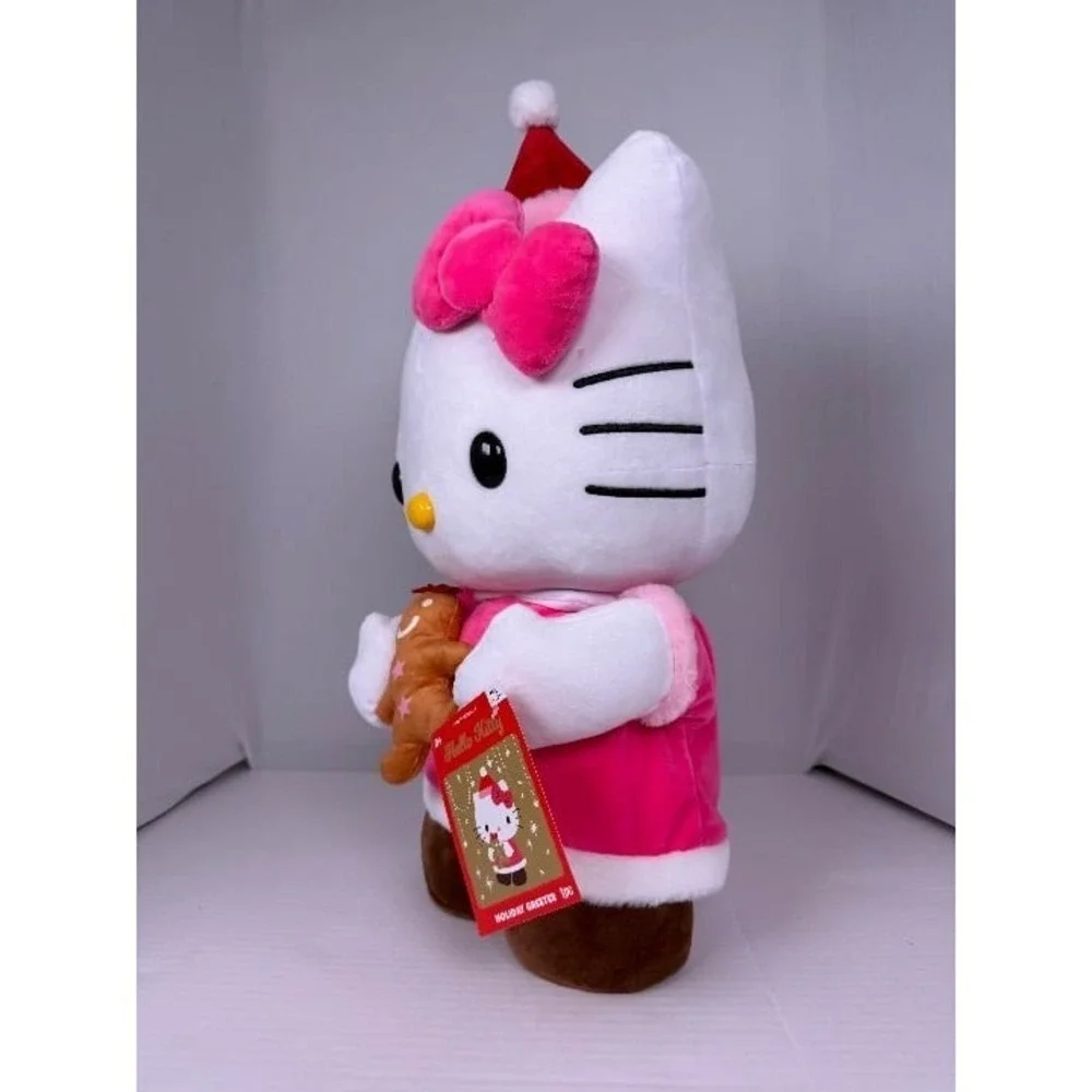NWT -‎ Hello Kitty holding Gingerbread Cookie Christmas Greeter-CVS 2025